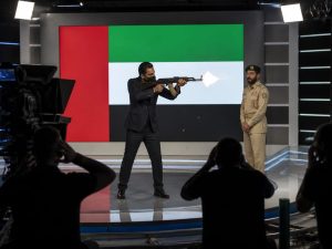 Iran State TV Host Hossein Hosseini Fires AK‑47 at UAE Flag