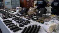 JFK seizure of hidden suppressor leads to 39 guns, explosives bust