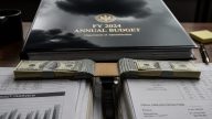 Newsom's Budget Masks $16.9B Deficit With One-Time Gimmicks
