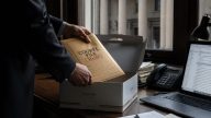 Ex-DOJ Lawyer Charged for Sending Sealed Smith Report as Cake Files