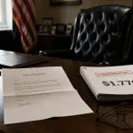 Top Treasury Lawyer Quits as DOJ Unveils $1.776B Trump Fund