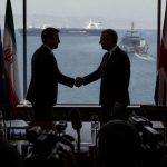 Trump Signs Iran MOU, Says Hormuz to Reopen — Critics Skeptical