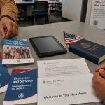 Refugee Welcome Packets Reveal PragerU, 1776 Commission Push