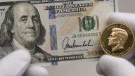 Treasury unveils $100 note with President Trump signature and coin