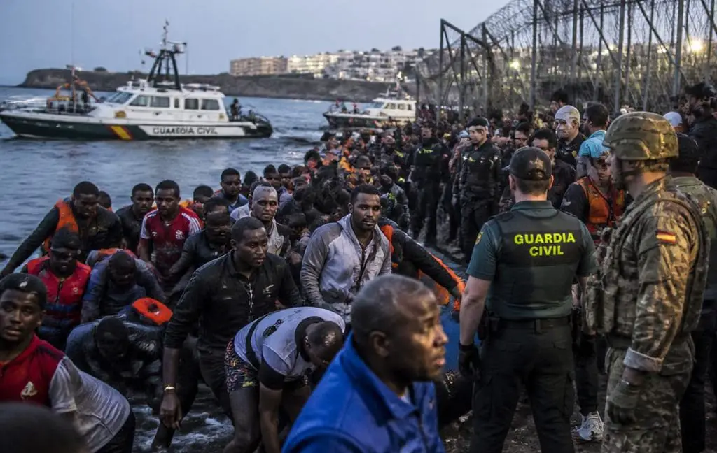 Ceuta Overrun: Sánchez Fails as Migrant Wave Breaches Spain's Border