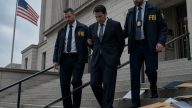 Ex‑Fed adviser gets 38 months for selling secrets to China