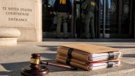 Healey Signs PROTECT Act Shielding ICE From Courthouses and Hospitals