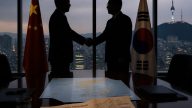 China Moves In: Wang Yi Visits Seoul After Trump Cuts Drills