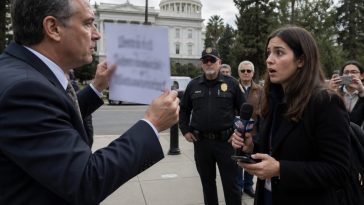 Terry Schanz flashes crude sign at reporter now facing HR complaints