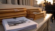 DOJ Uses Alias for Representative Ilhan Omar as Warrant Lingers